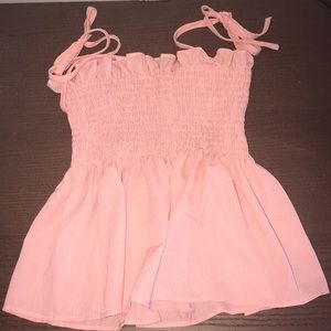 cropped tube top (flows on the bottom)